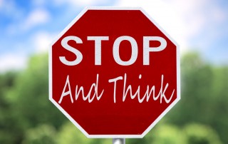 Stop Sign with Words Stop and Think