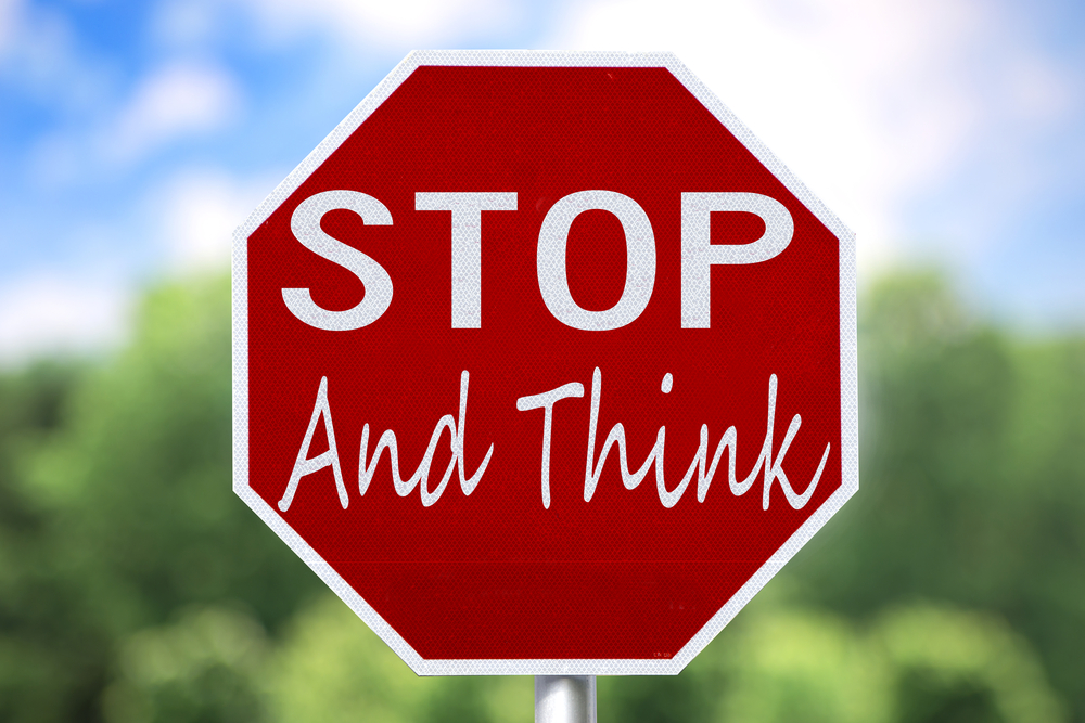 Stop Sign with Words Stop and Think