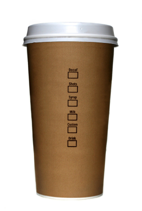 image of a foam coffee cup with brown outer sleeve