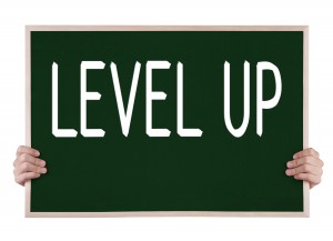 The words Level Up on a chalkboard
