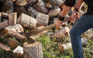 Man chopping wood with an axe