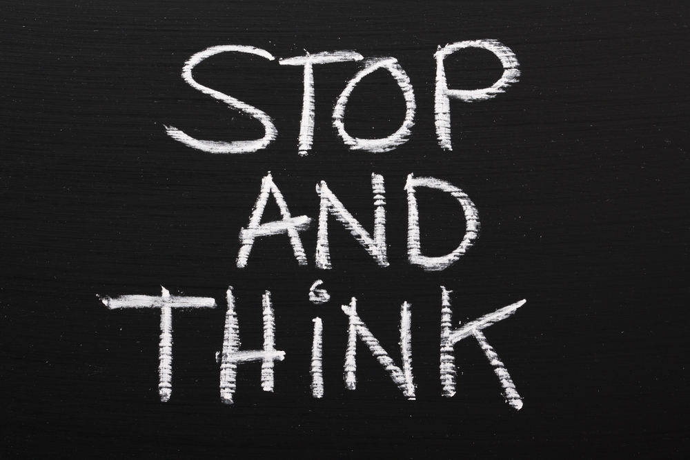 stop and think on chalkboard