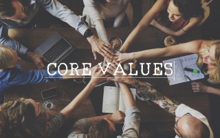 workplace team with word core values over the image