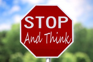 Stop sign with words: Stop and think