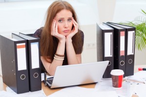 image of professional woman bored at work