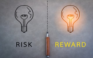 image of two lightbulbs with captions: risk, reward